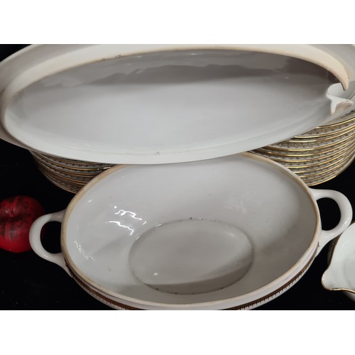 927 - A Lovely large dinner set by Emaux Dd Limoges, With lovely white porcelain and gold detail. Will put... 