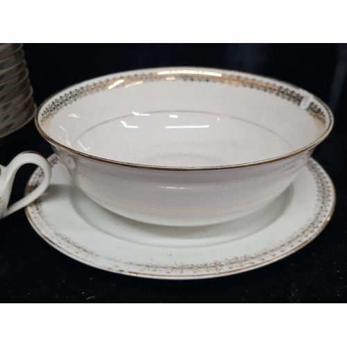 927 - A Lovely large dinner set by Emaux Dd Limoges, With lovely white porcelain and gold detail. Will put... 