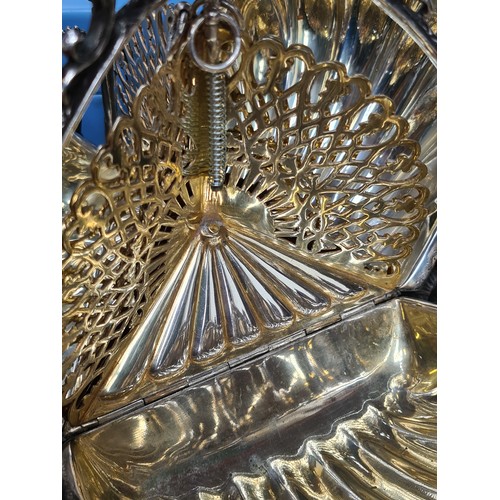 992 - Star Lot: A late Victorian silver plated EPNS triple wing muffin warmer. A very impressive centre pi... 