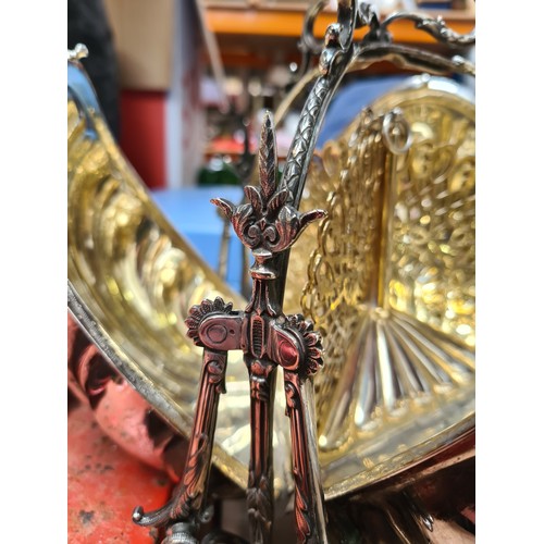 992 - Star Lot: A late Victorian silver plated EPNS triple wing muffin warmer. A very impressive centre pi... 