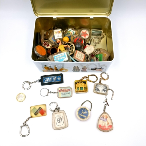 29 - A collection of 48 assorted key rings of French origin. Enclosed in a metal box and titled Provence.... 