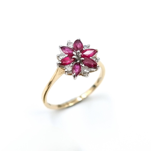 4 - Star Lot : A very pretty ruby and diamond cluster ring set in nine carat gold (375). Ring size - S. ... 