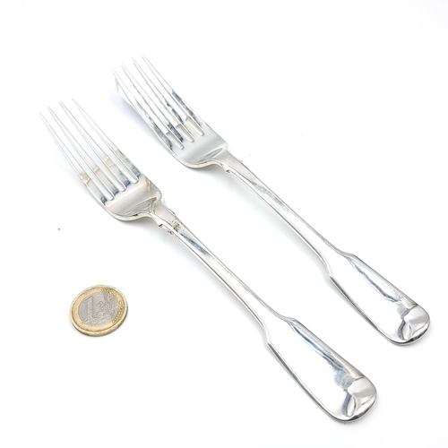 48 - Two Irish silver dinner forks dated 1862. Length - 20 cms. Total weight - 123 grams.