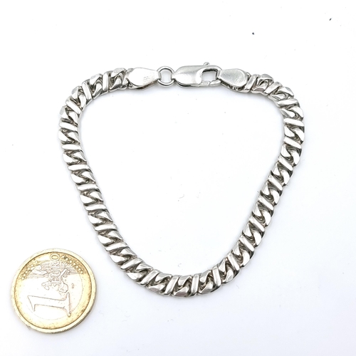 54 - A unisex Sterling silver bracelet with lobster clasps. Weight - 20 grams.