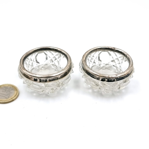 58 - A pair of antique hob nail cut glass pin dishes set with silver rims. Hallmarked Birmingham - 1921. ... 