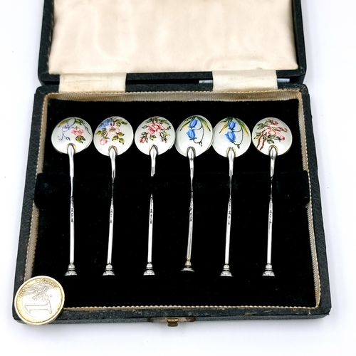 59 - A super p[retty collection of sterling silver coffee spoons with attractive enamelled floral detaili... 