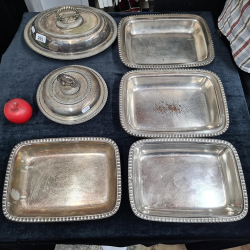 205 - Two EPNS silver plated tureens along with four serving trays. All in good order.