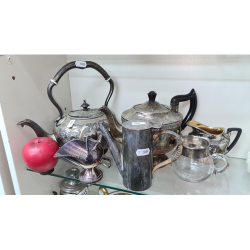 217 - A lot of six Victorian silver plated items including teapots, jugs and a sugar bowl.