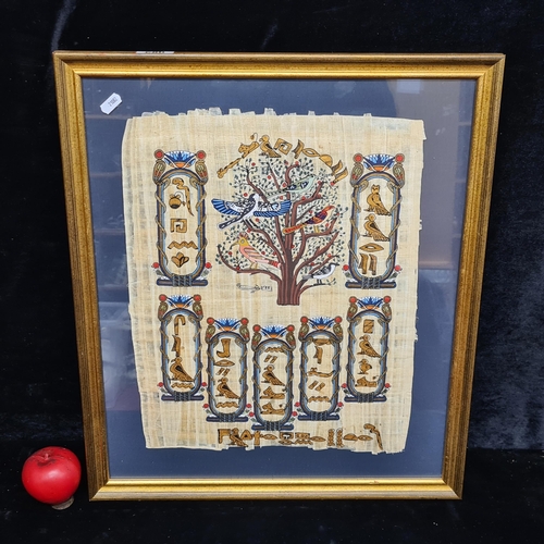 82 - An Egyptian gouache on papyrus painting. Features the tree of life with gilt detailing. Housed in a ... 