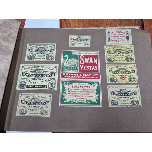 165 - A vintage 'Snappy Snaps' album of advertising safety matches. Including some Swan, Byrant & May's, M... 