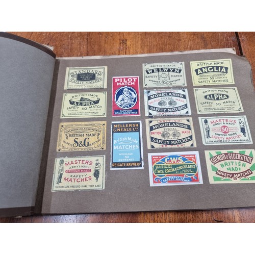 165 - A vintage 'Snappy Snaps' album of advertising safety matches. Including some Swan, Byrant & May's, M... 