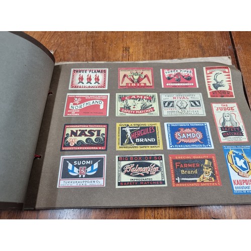 165 - A vintage 'Snappy Snaps' album of advertising safety matches. Including some Swan, Byrant & May's, M... 