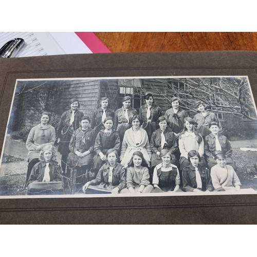 172 - An intriguing early-mid 20th century photographic souvenir album containing images of past pupils an... 