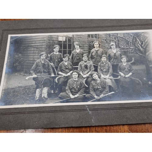 172 - An intriguing early-mid 20th century photographic souvenir album containing images of past pupils an... 