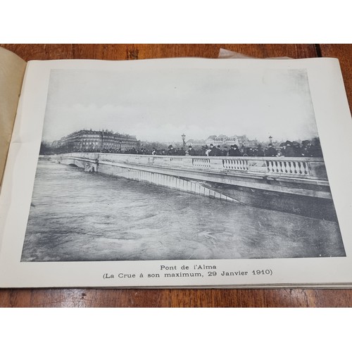 173 - A fantastic photo album, dated 1910 depicting imagery of Parisian landmarks, including photos of La ... 