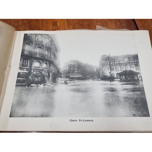 173 - A fantastic photo album, dated 1910 depicting imagery of Parisian landmarks, including photos of La ... 