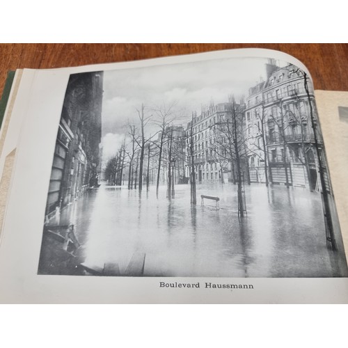 173 - A fantastic photo album, dated 1910 depicting imagery of Parisian landmarks, including photos of La ... 