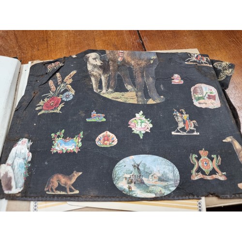 178 - A fabulous leather bound scrapbook comprising of several pages of prints and imagery. Album cover fe... 