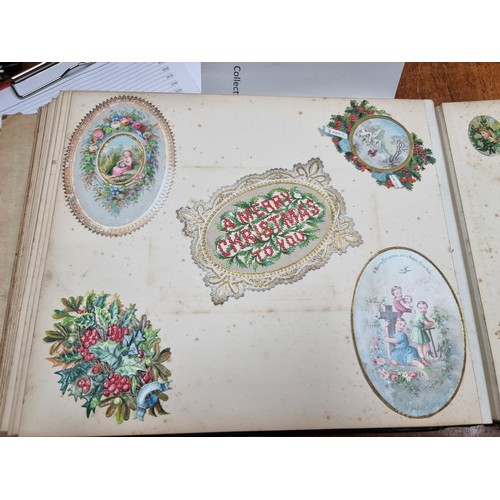 178 - A fabulous leather bound scrapbook comprising of several pages of prints and imagery. Album cover fe... 