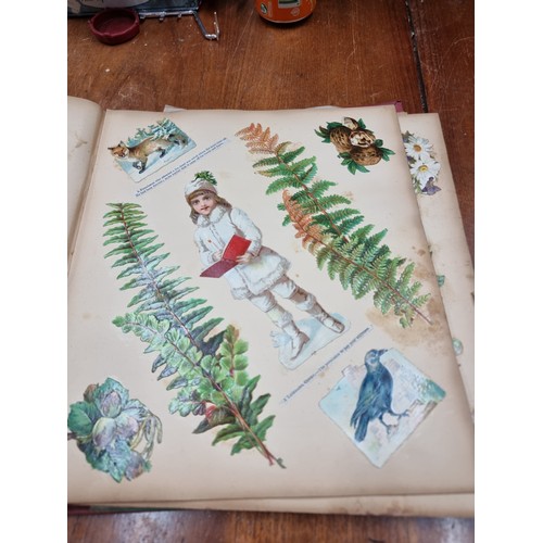 176 - Two fabulous antique decoupage scrapbooks, one dated 1872 consisting of Victorian imagery, prints an... 