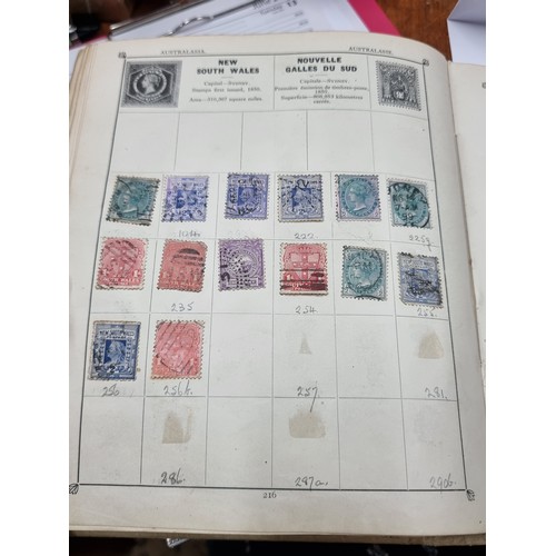 209 - A fantastic Fourth Edition of the Triumph Stamp Album for British and Foreign stamps. Printed in Eng... 