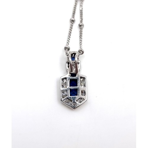 19 - Star Lot : A very pretty 9ct white gold art deco style Sapphire pendant with attractive bright cut 9... 