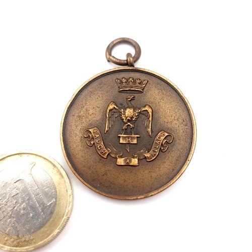 45 - A most interesting Royal Irish Fusiliers Inniskilling competition medal dated 1928. Medal comes in o... 