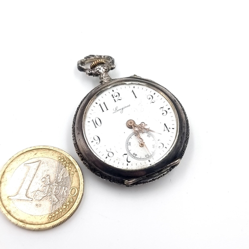 26 - A high quality antique pocket watch with stunning wild shamrock relief motifs with green enamel. Inc... 