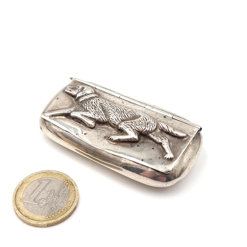 27 - A Fabulous Sterling Silver vinaigrette with hinge lidded dog motif. Hallmarked 925. Length - 7 cms. ... 