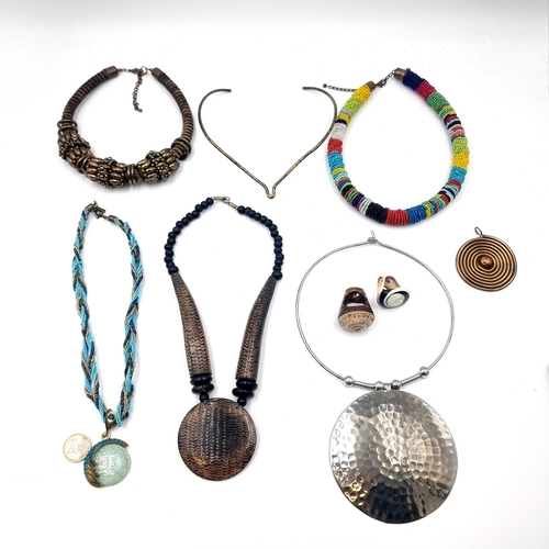 30 - An interesting collection of African tribal items consisting of two choker necklaces. Dimensions - 4... 