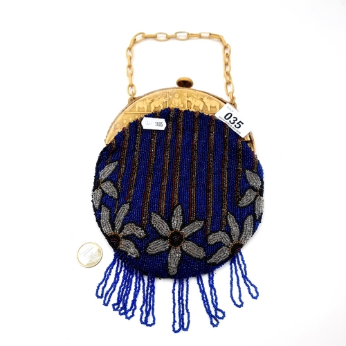 35 - A vintage evening hand bag set with elephant decoration to mount in Indian style with a striped bead... 