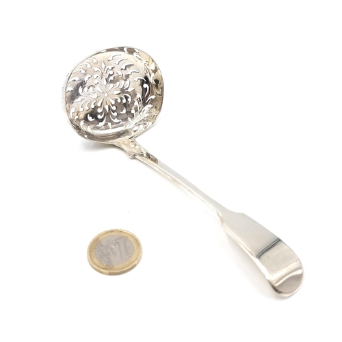 40 - A sterling silver sugar sifter spoon. Hallmarked London - 1835. Length - 14 cms. Bowl - 6 x 4.5 cms.... 