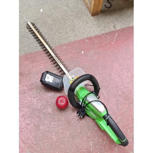 363 - A Florabest Laser cut Hedge trimmer with battery and charger.