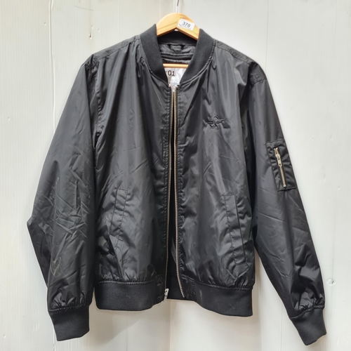 370 - A sleek black bomber jacket made by Bird Rides, featuring a quality zipper and versatile style for u... 