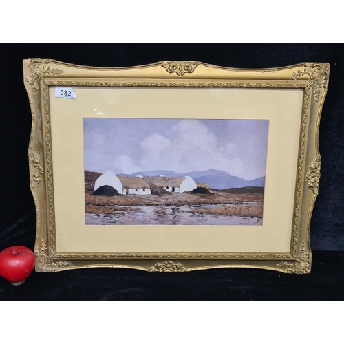 82 - A wonderful print of a 'Paul Henry' oil painting titled 'Cottages by the Lake'. Features a tradition... 