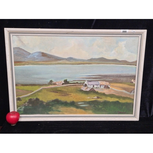 88 - A large vintage oil on board painting featuring a calming West of Ireland landscape scene. Signed J.... 