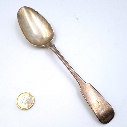 931 - A sterling silver serving spoon hallmarked Glasgow - 1855. (Victoria young head) Weight - 65.46 gram... 