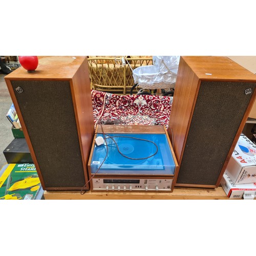 428 - Mid-Century Modern wooden storage cabinet features a drop-down front door and a spacious interior. T... 