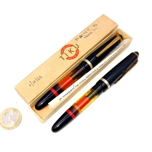 976 - Two original Tiku Stylo Pen with red ring dated 1965 / 1967. With original instruction manual. In or... 