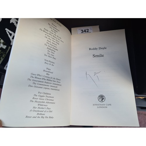 342 - Two Books including The Black and Trans by Richard Bennett and a paper book hand signed by Rody Doyl... 