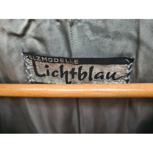 376 - Star Lot  : An unusual and stylish vintage fur coat in a black and white shade from Lichtblau. Appro... 