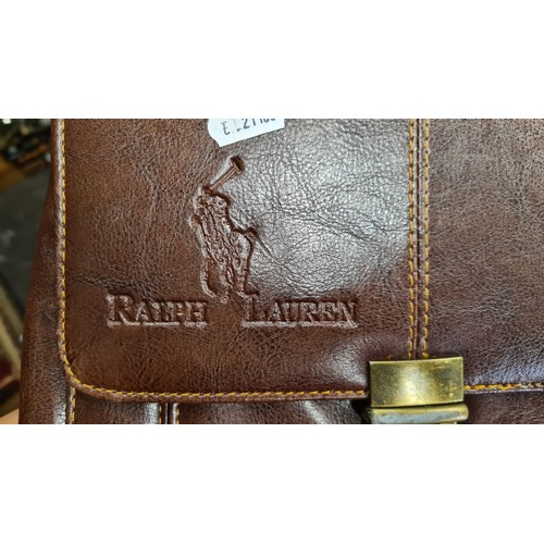 208 - A super stylish brown leather Ralph Lauren branded satchel bag complete with shoulder strap, interna... 