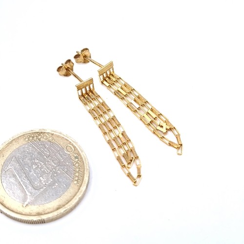 366 - Star Lot: An unusual and gorgeous pair of 9K gold drop down link earrings.