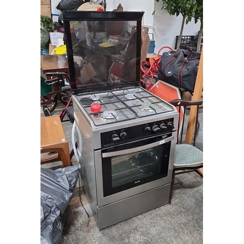 369 - Star lot : A Sauter branded oven with four ring gas hob. Model SCG1010X. This appears to be barely u... 