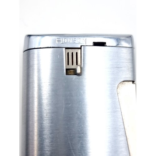 14 - A Ronson gas lighter in polished satin finish. Comes in original presentation box.