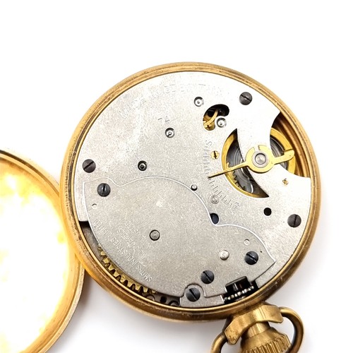 17 - A gold toned Smiths  top wind pocket watch with gold face and black roman numeral figures. Watch has... 