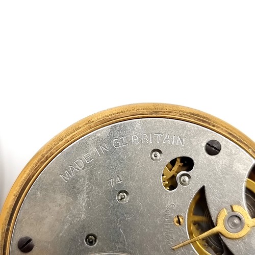 17 - A gold toned Smiths  top wind pocket watch with gold face and black roman numeral figures. Watch has... 