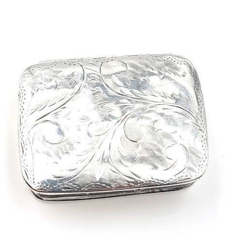 28 - A sterling silver snuff box with hinged lid an attractive foliate design. Dimensions - 4.5 x 3.5 cms... 