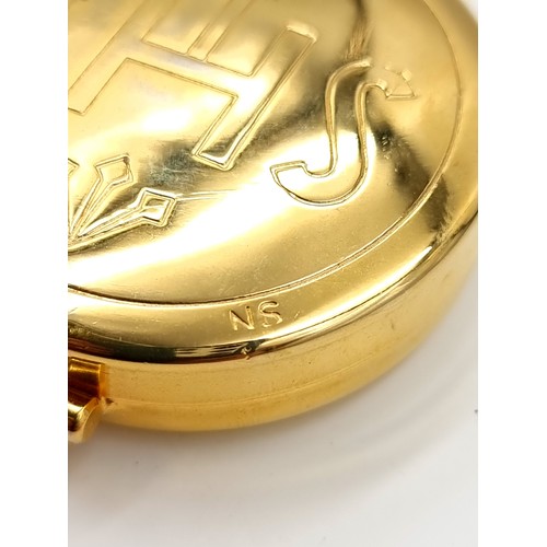 980 - A gold plated pyx communion set with I.H.S inscription.