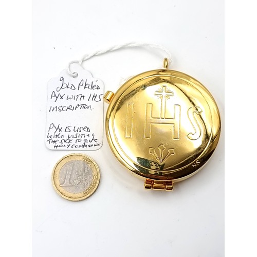 980 - A gold plated pyx communion set with I.H.S inscription.